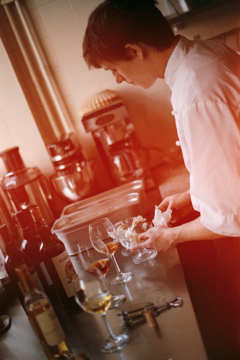 Gelato being prepared at a stainless steel worktop